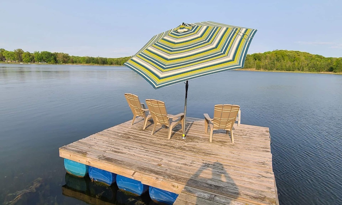 Delton House | 3 bedroom home on a peaceful private no wake lake. With kayaks and floating deck