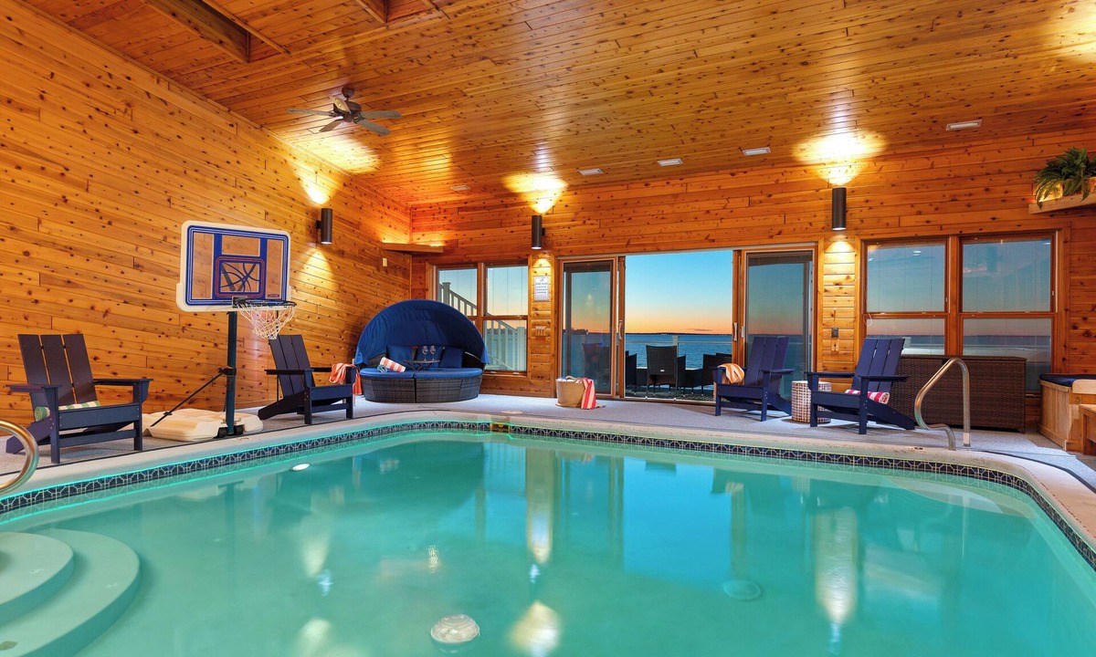 Prudenville House | 6BR Houghton Lake House w/Indoor Pool, Hot Tub, and Golf Simulator - Sleeps 24