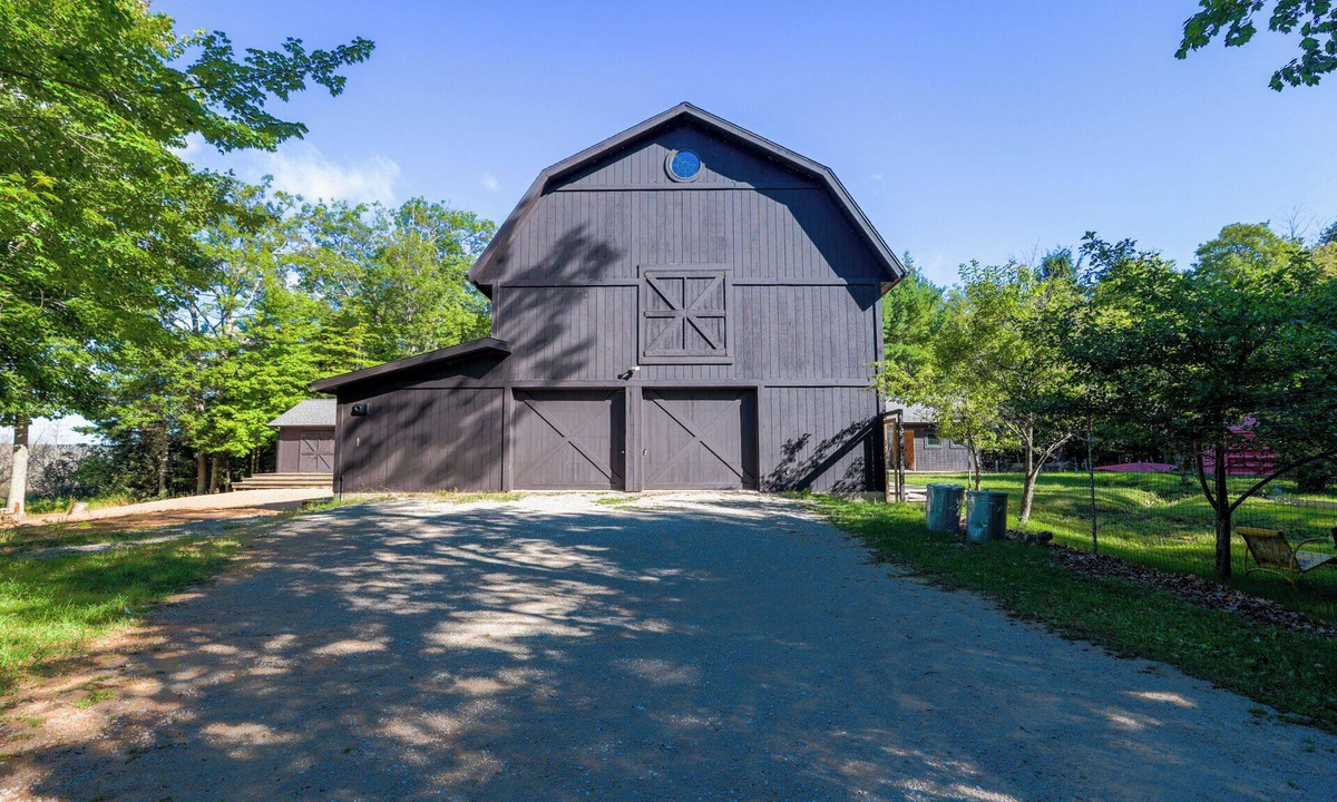 Escanaba House | Barn-style home with indoor pool and sauna on Little Bay de Noc