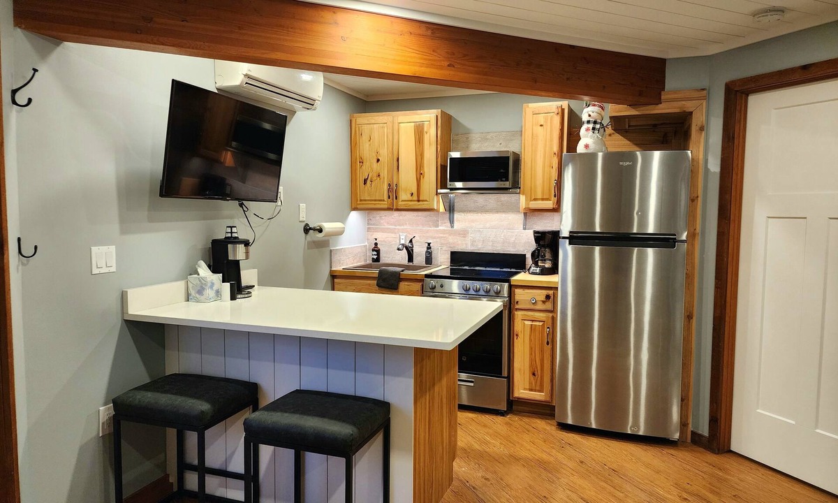 Mancelona Condo | Beautiful sleeps 4 Schuss Village Golf Course, pool, boat parking, Nearby Lakes