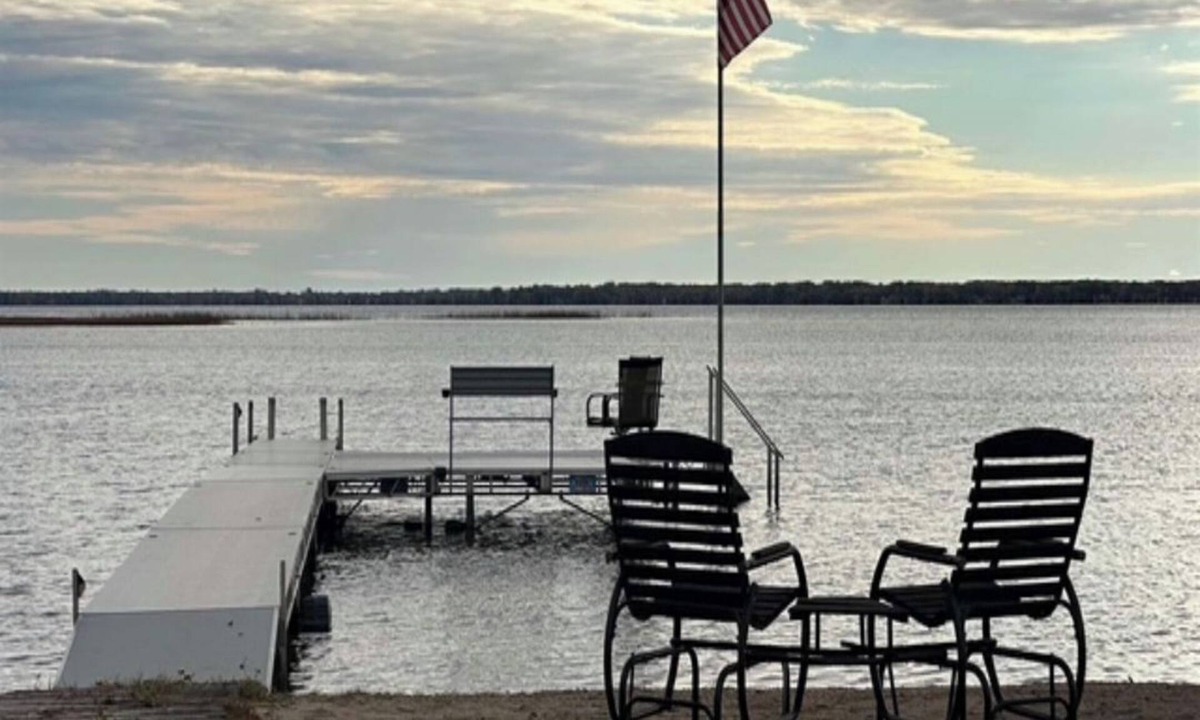 Shawano Cottage | Cozy lakefront home rests on Shawano Lake - swimming, fishing, boating, dock.