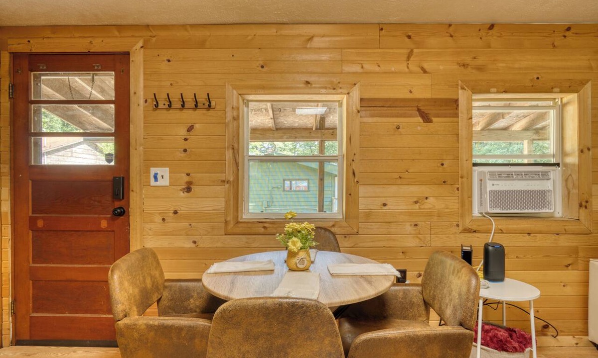 Fountain Cabin | Cozy Log Cabin with Dock, Kayaks, Firepit, AC, minutes to Ludington and Lake MI
