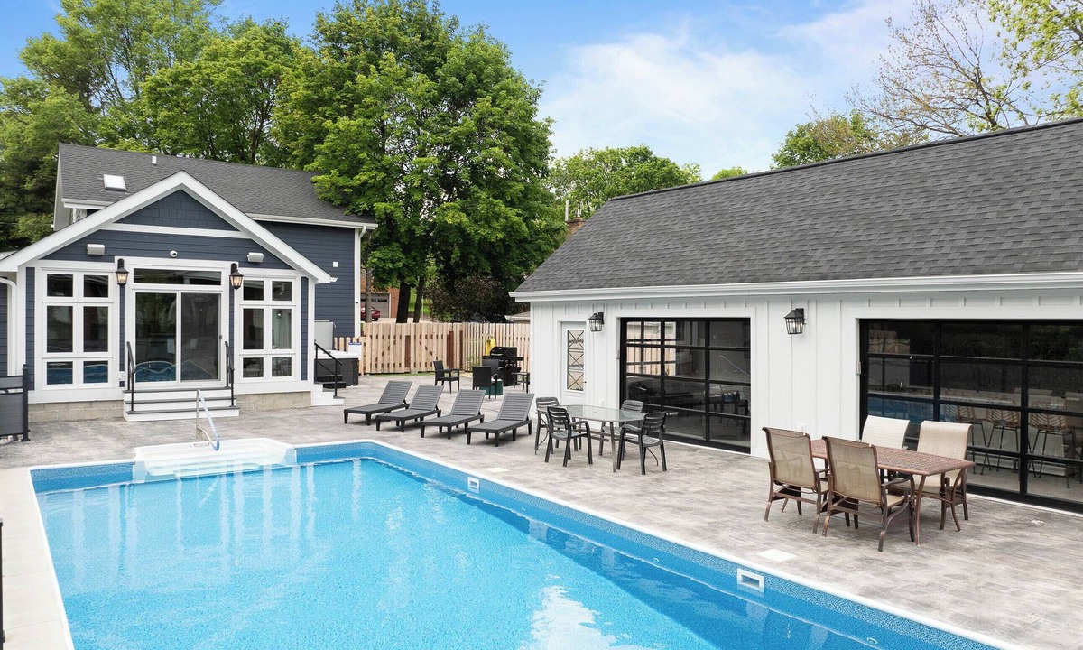 Lake Geneva House | Lake Geneva Pool Retreat with Saltwater Pool Hot Tub and Garage Bar