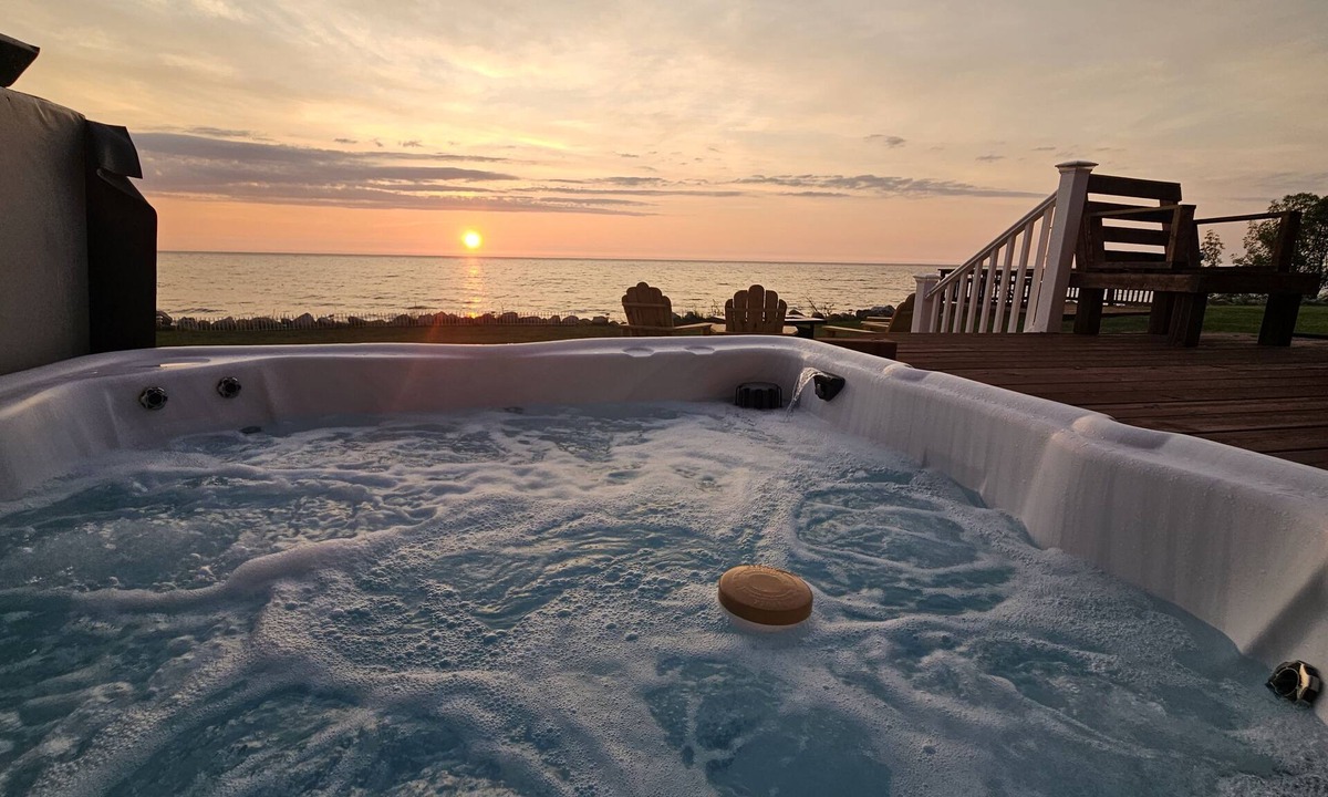 Mears House | New! Luxurious 5-bedroom home on Lake Michigan w/hot tub and lake access—Mears