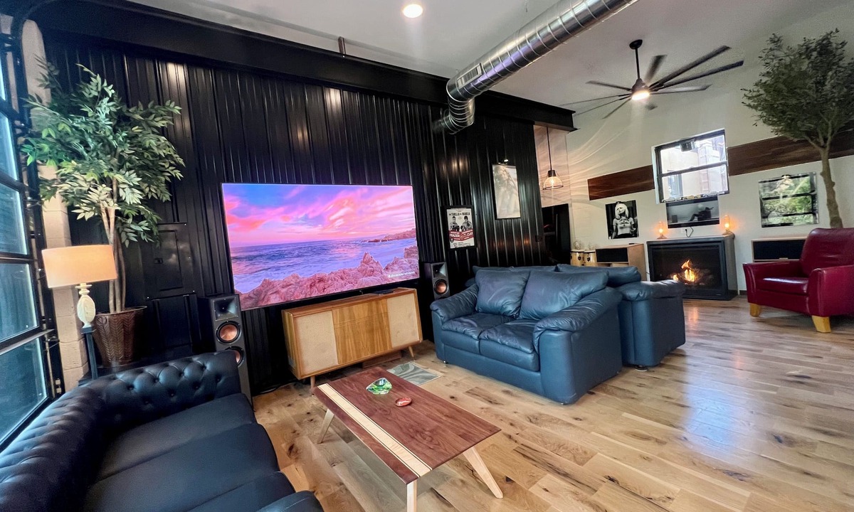 Nunica House | New renovation retro-Modern 1960s Service Station Fireplace 100″ TV garage