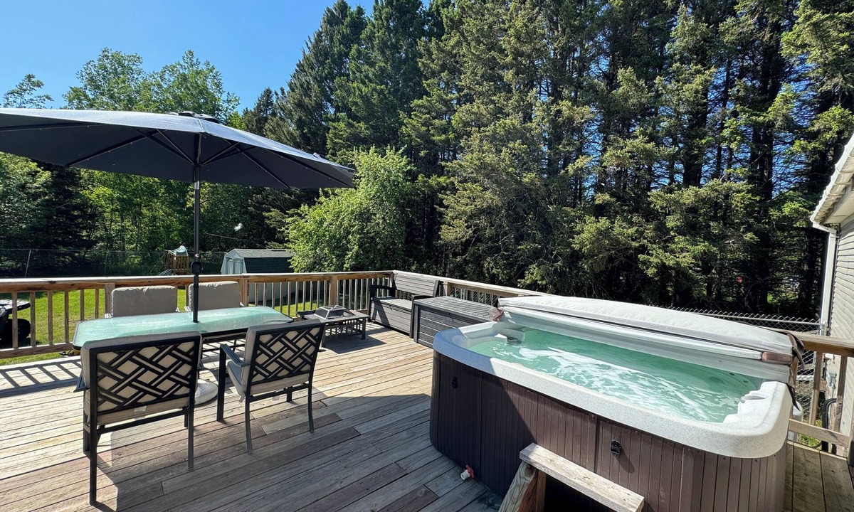 Upper Peninsula Michigan House | Relaxing getaway with fenced in yard & hot tub!
