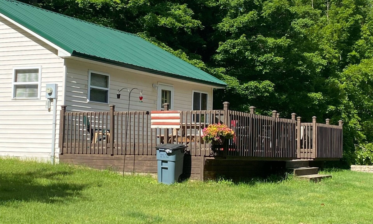 Rudyard Cabin | Secluded Deerfoot cabin getaway with WIFI near Trout Lake