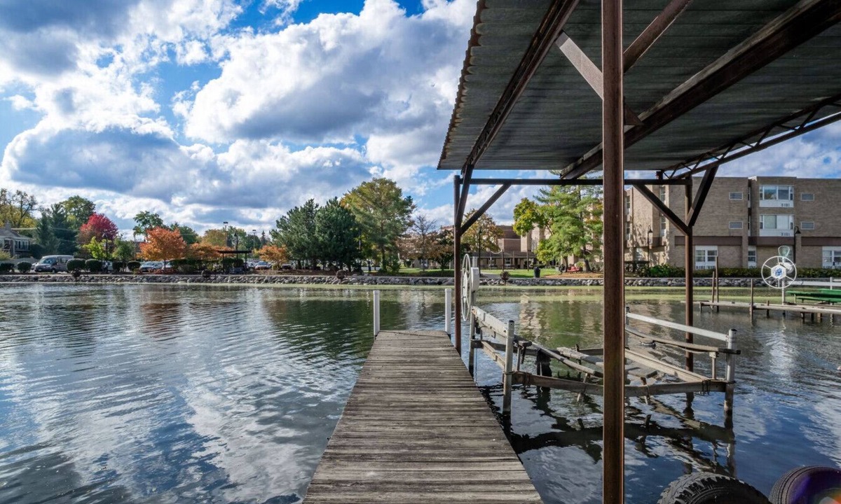 McHenry House | Waterfront Vacation Rental on Fox River | Walk to Downtown McHenry | 3BR/2BA Home with Private Pier
