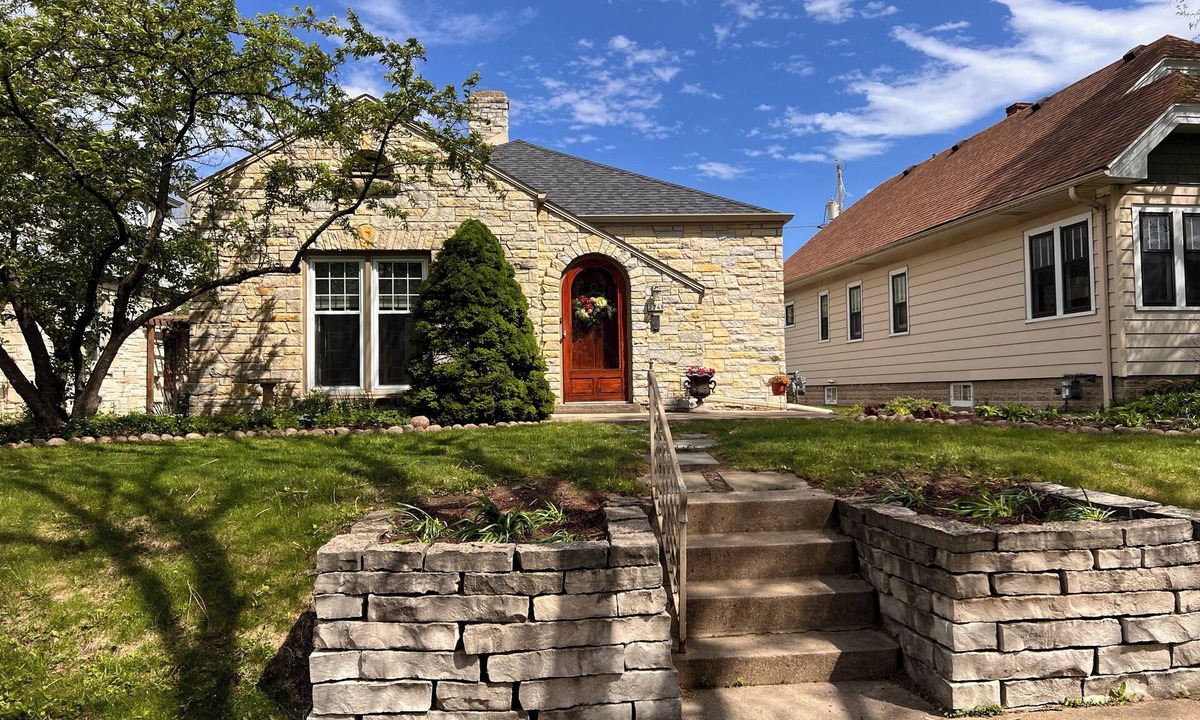 Milwaukee House | Welcome to the Charming Stone Haven, a beautiful three bedroom property.