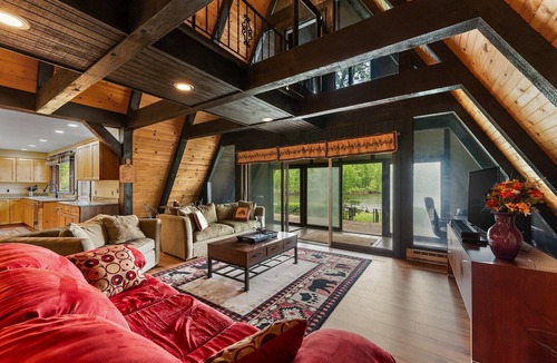 Thayer House | 100 ACRES WITH PRIVATE LAKE! Retro Riverside Retreat Groovy A-Frame