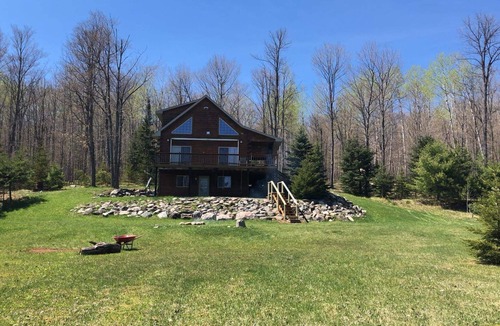 Iron River House | 3 bed/2 bath, Pet friendly Log Lakehouse on 5 acres. Private and & relaxing.