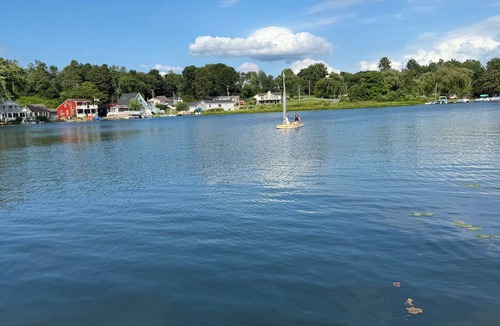 Smyrna Cottage | 3-bedroom cottage on beautiful Big Pine Island Lake. Sandy beach, huge deck.