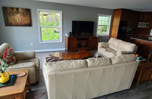 Delton House | 3 bedroom home on a peaceful private no wake lake. With kayaks and floating deck