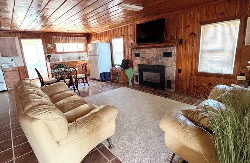 White Cloud House | 3-bedroom lakefront home on All-sports lake with private beach and dock.