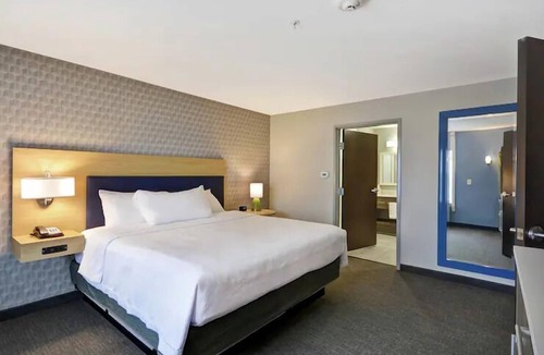 Alpine Center Hotel | 3 Pet-Friendly Suite with Kitchenette + Free Parking near Downtown Grand Rapids