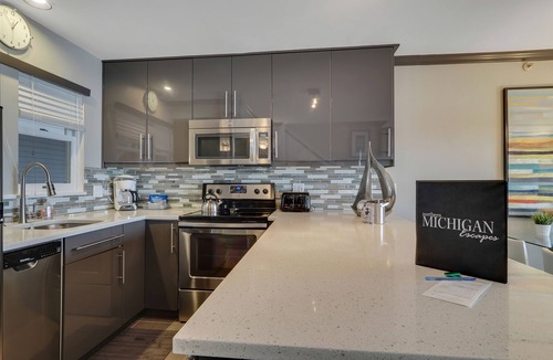 Boyne City Condo | 311 Water Street | Condo with Lake Charlevoix Views | Private Beach Access
