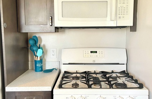 Traverse City Cottage | 3BR cottage on SE Lake Leelanau with private beach, marina and playground!
