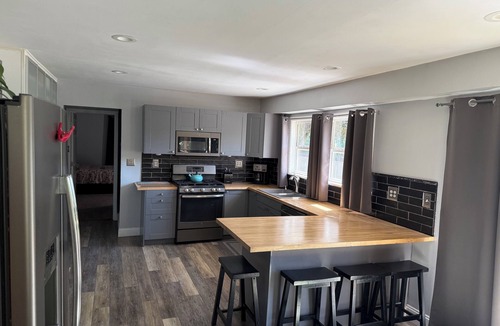 Fort Gratiot House | 4-bedroom house on the Black River in Fort Gratiot. Dock your boat out back!