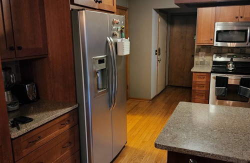 Lansing House | 5-Star 3 bedroom home with heated pool and hot tub! 10 minutes away from MSU