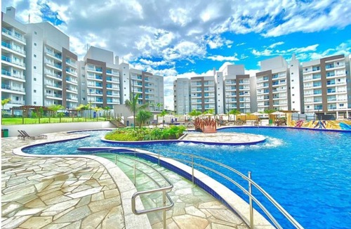 Setor Lagoa Quente Apartment | 54 m² apartment, 2 bedrooms (1 suite), balcony, kitchenette and living room
