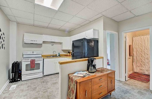 Holy Cross House | 9 bedrooms, 3 full kitchens, 3 full Baths, Laundry, Downtown Indy. Sleeps 20+