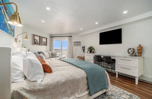 Traverse City Apartment | "A Room with a View" East Bay Waterfront with Pool