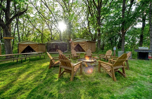 East Troy RV Rental | Amazing Group Glamping in Restored Vintage Girl-Scout Tents for a Unique Outdoor Adventure in Troy, Wisconsin
