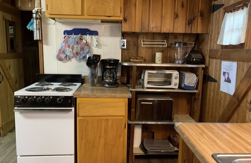 Lewiston Cabin | Bailey’s Rustic Lakehouse on beautiful, All-Sports Tee Lake in Lewiston, MI.