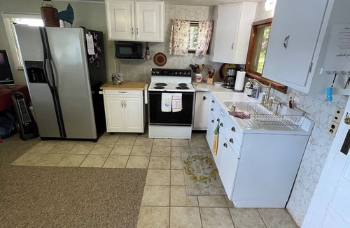 Mecosta Cottage | Beach Front Cottage On Family Friendly Pretty Lake. Sunsets, Fishing And Fun!