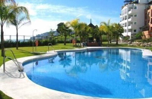 Velilla-Taramay Apartment | Beachfront apartment, swimming pool with salt water, gardens 2 min walk to the beach.