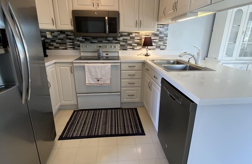 Coldwater House | Beautiful Lake View IYopawa Island Home. Backs up to Golf Course