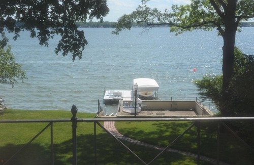 Enchanted Hills House | Beautiful Lake Wawasee home with 5 bedrooms 4.5 bathrooms and pier with boatlift