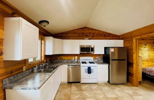 Mayfield Cabin | Beautiful Waterfront, Traverse City AC, dog ok, pontoon rentals, outdoor hot tub