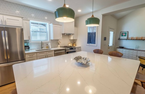 Michigan City House | Bold & Fun Getaway Steps from Train & Beach