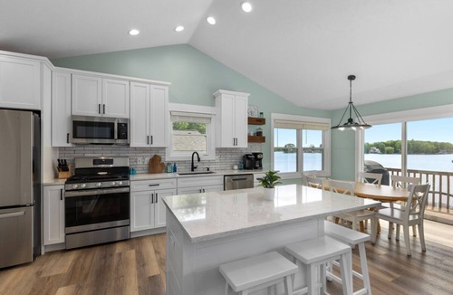 Canadian Lakes House | Canadian Lakes lakefront home with breathtaking sunrises and a hot tub!