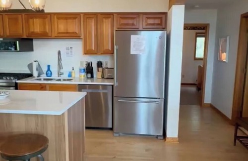 Manistique House | Captain's Watch: Savor Summer with Private Beach Access and Lake Views