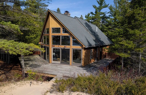 Manistique House | Captain's Watch: Savor Summer with Private Beach Access and Lake Views