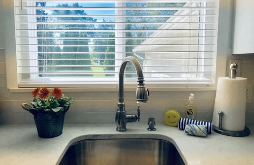 North Muskegon Cottage | CHANNELSIDE COTTAGE! Amazing views of Muskegon Lake & 10 mts from Lake Michigan!
