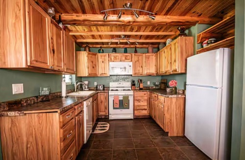 Escanaba House | Charming 3-bedroom Farmhouse with WiFi, AC, Hot Tub & Sauna in Escanaba Mi