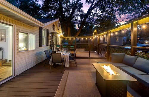 Zenda House | Charming Cottage with Firepit & Sunroom Retreat in Lake Geneva, Wisconsin