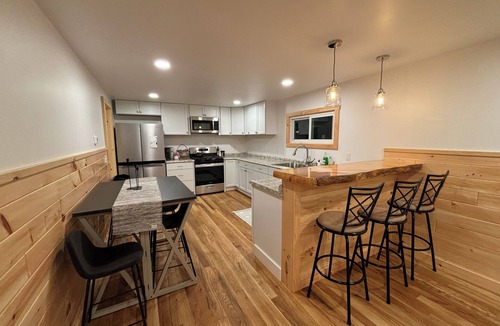 Boyne Falls Cabin | Charming Red Cabin in the woods. A perfect stay just 3 min from ski resort!