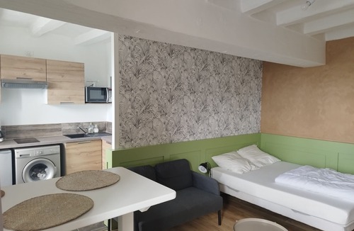 Le Vieil-Bauge Apartment | Charming studio at the foot of the twisted bell tower