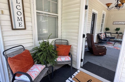 Shelbyville Apartment | Charming Victorian at Lake Shelbyville ⋅ Sleeps 6 ⋅Sunroom ⋅ Fire Pit ⋅ Parking