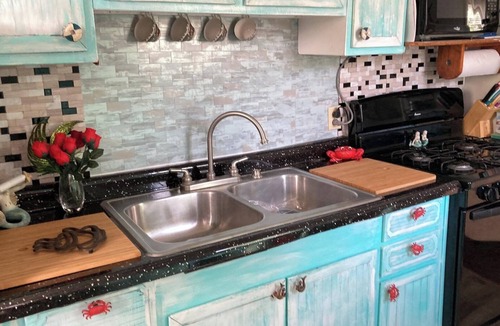 Wolcottville Cottage | Charming, Whimsical. ,2-bedroom cottage On Chain of Lakes.