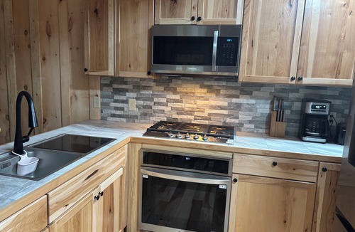 Au Train Cabin | Completely updated one bedroom cabin with a hot tub on AuTrain Lake