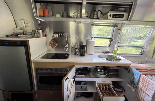 Morris House | Cozy 1-bedroom Bambi Airstream camper on a 56 acre farm with stream and woods.