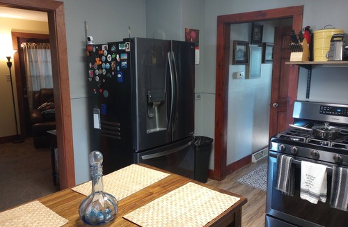 Ishpeming House | Cozy corner lot will provide a comfortable space for a couple or small family.