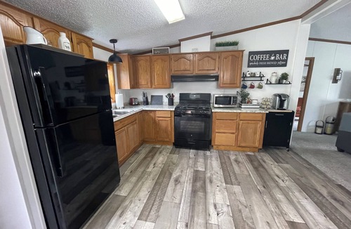 Northeast Michigan House | Cozy country home, “Sunny Meadows” in Cadillac on 40 Acres! Pet Friendly.