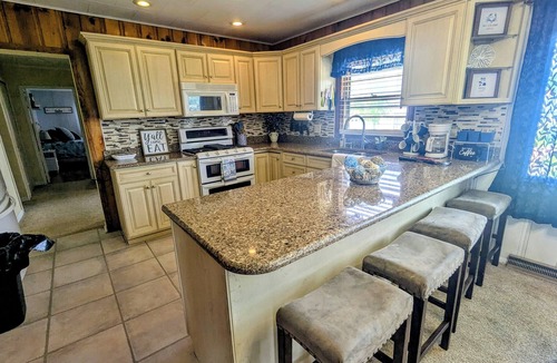 Bass Lake House | Cozy Ranch Retreat! Peace, Lake Views, Game Room & Hot Tub