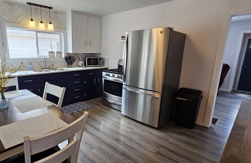 Sault Ste. Marie House | Cozy Up North Retreat in the Heart of Sault Ste. Marie. Pet Friendly! Hot Tub!